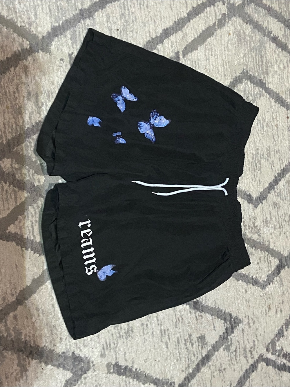 SHEIN Black Athletic Shorts with Blue Butterfly Print